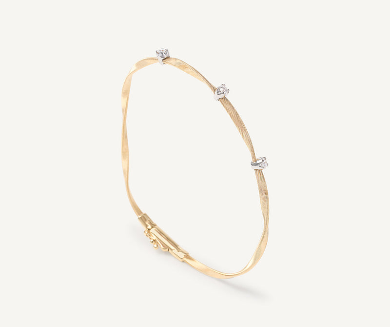 Marco Bicego 18K Yellow Gold Coil Bangle with Diamond Stations, 2mm at Màti Jewelers Albuquerque