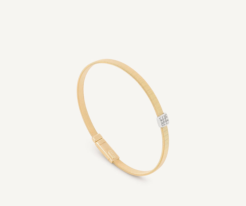 Marco Bicego 18K Yellow Gold Coil Bangle with Diamonds, 4mm at Màti Jewelers Albuquerque