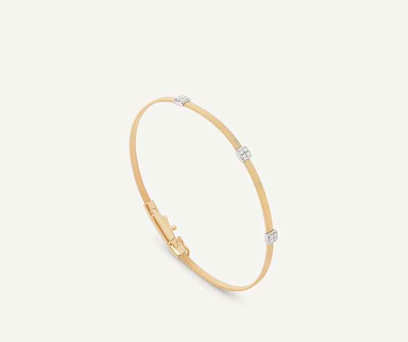 Marco Bicego 18K Yellow Gold Coil Bangle with Diamonds, 2mm at Màti Jewelers Albuquerque